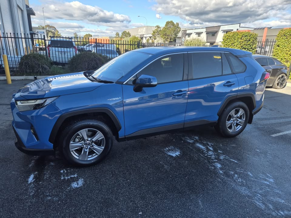 2023 Toyota RAV4 GX Hybrid in blue — photo 5 of 5