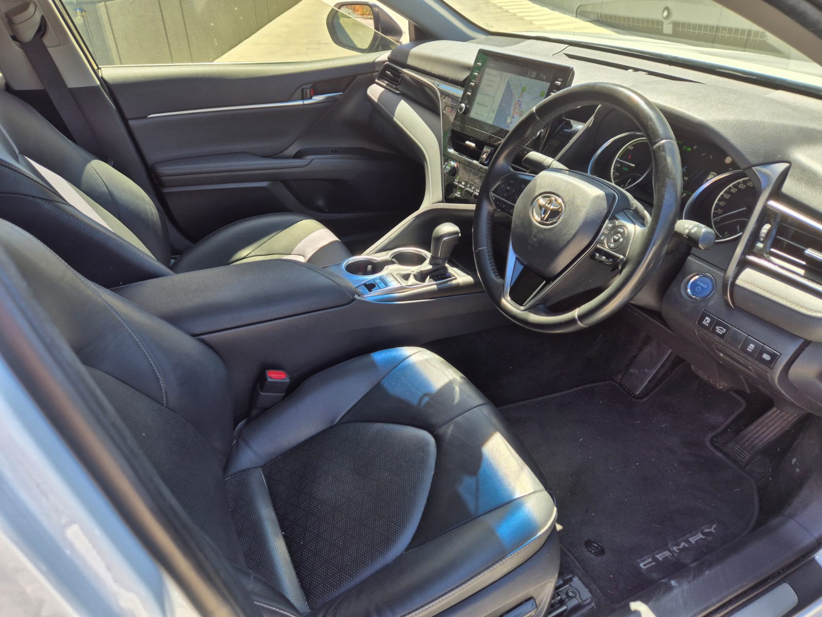 2023 Toyota RAV4 GX Hybrid in blue — photo 3 of 6