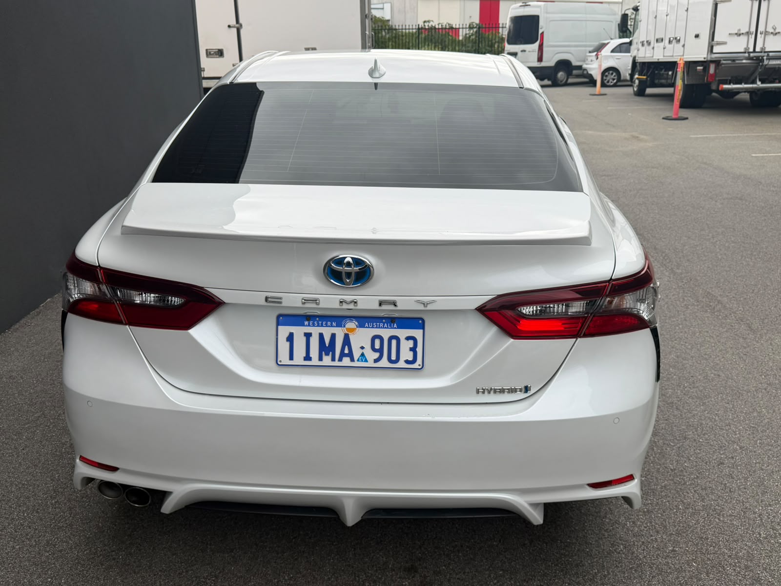 2023 Toyota Camry Hybrid Sport in white — photo 2 of 6