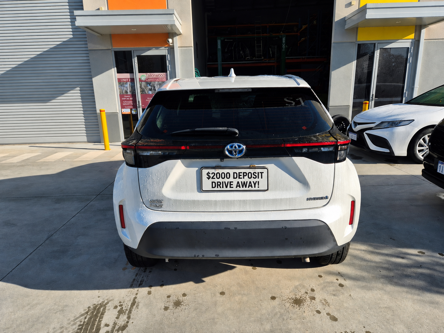 2024 Toyota RAV4 Hybrid in white — photo 2 of 7