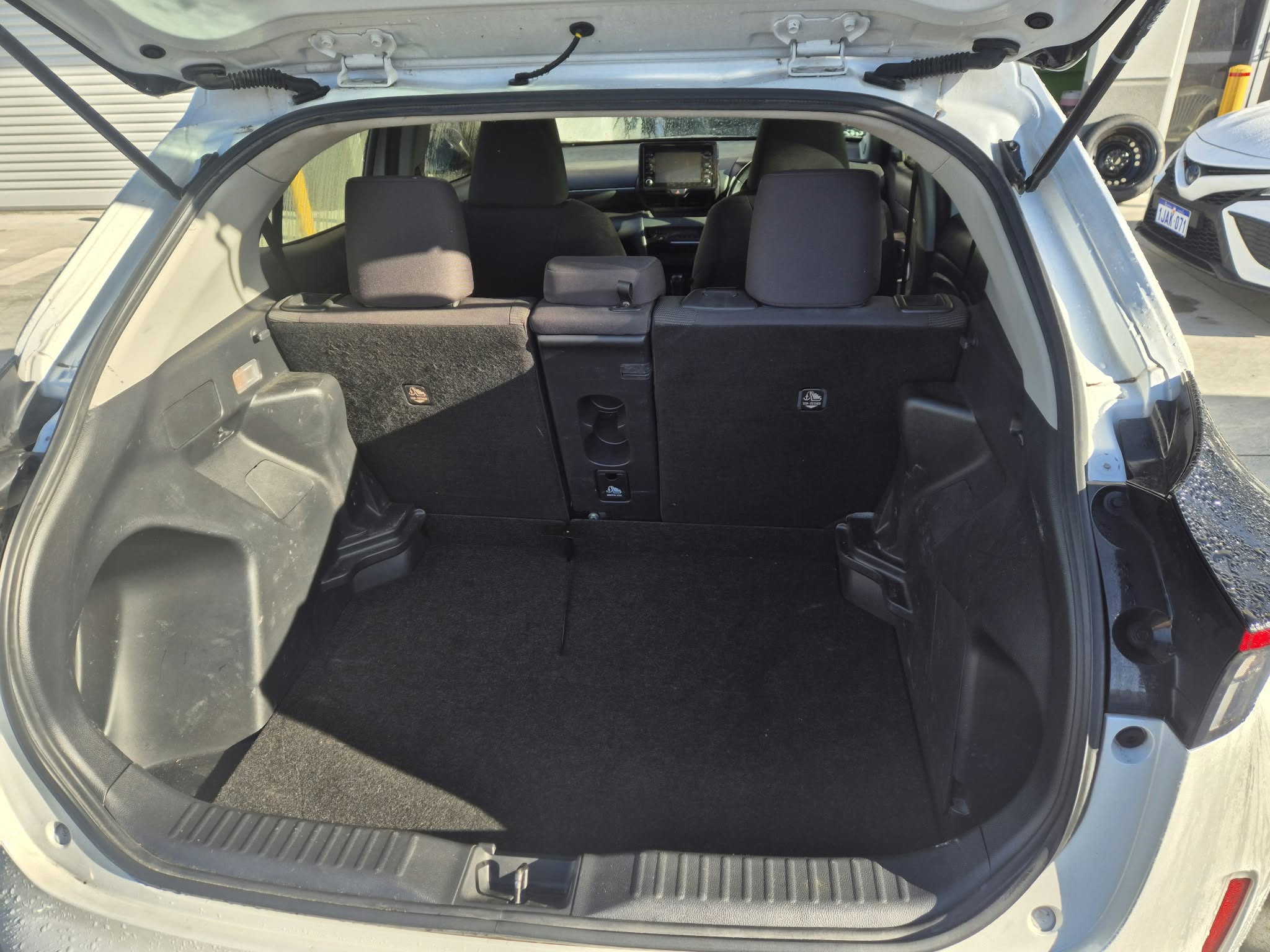 2024 Toyota RAV4 Hybrid in white — photo 4 of 7